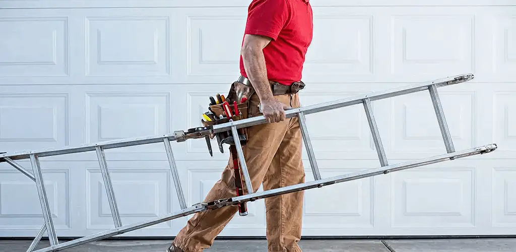 Garage door repair technician arriving with tools and ladder in Staten Island, NY
