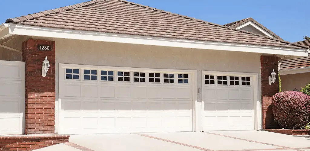 Residential garage door repair service for a double garage door in Staten Island, NY