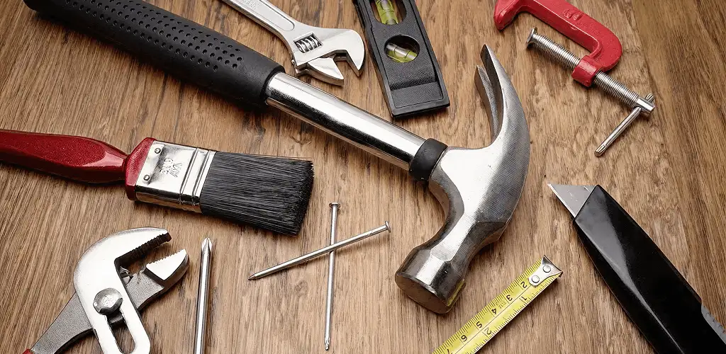 Handyman tools laid out for home repair and maintenance work in Staten Island, NY